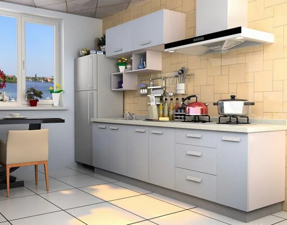 Kitchen cabinets arranged around a sink and appliances