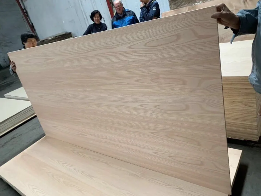 An oak-veneered MDF sheet showing the full face grain